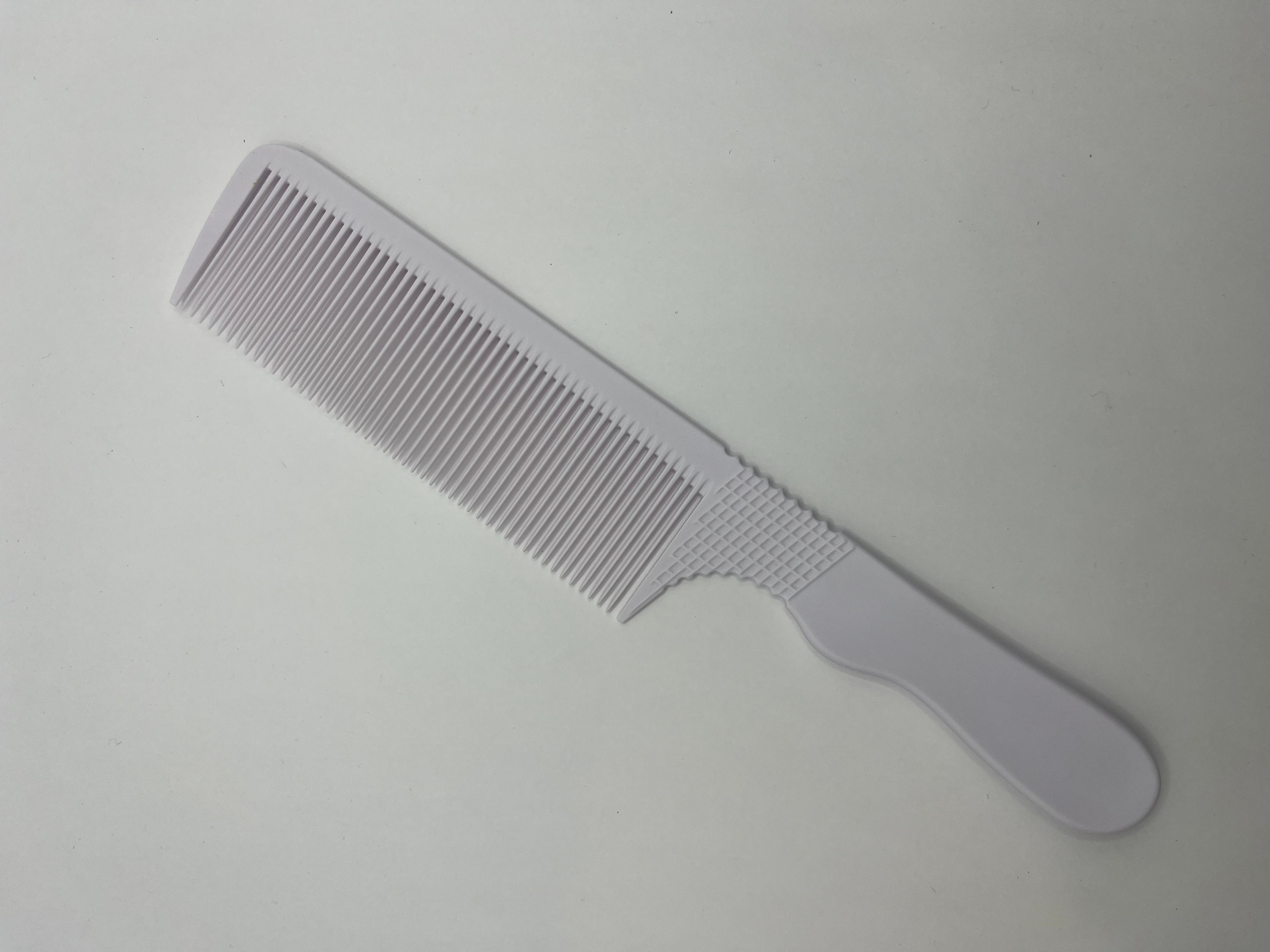 the tactile grip wide flat top barber comb white